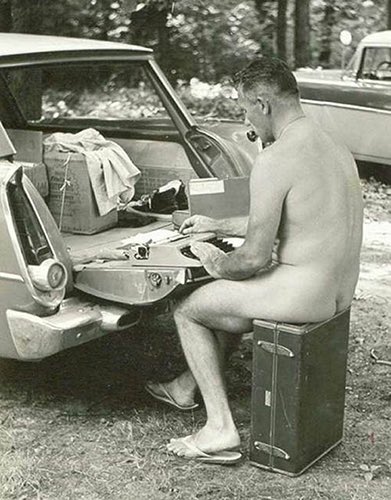 Find inspiration in the wild like this naked man at his typewriter. 